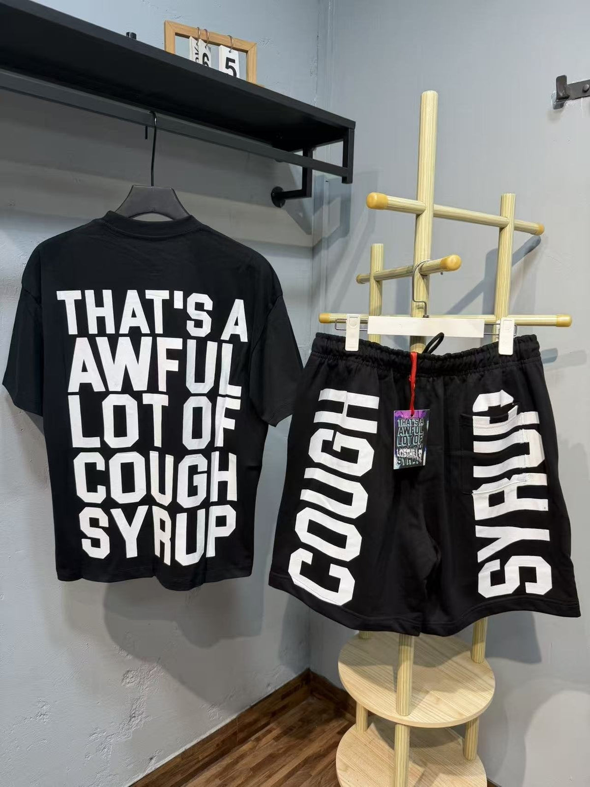THAT'S A AWFUL LOT OF COUGH SYRUP Bold Wordmark Short-Sleeve Set